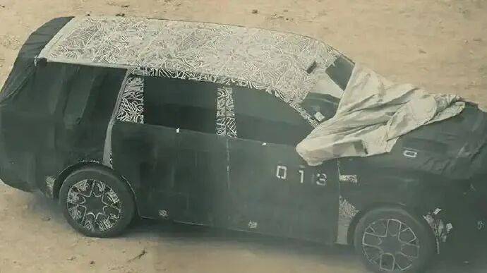 疑似小米YU9新疆试车<strong></p>
<p>新华百货股票</strong>,多张路测谍照曝光